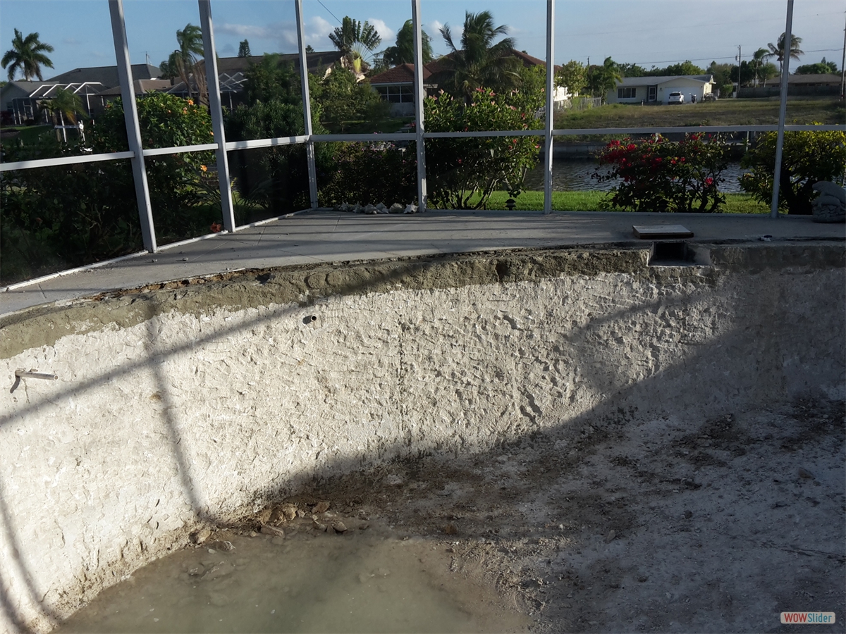 For further protection he puts a board on top. For further protection he puts a board on top.