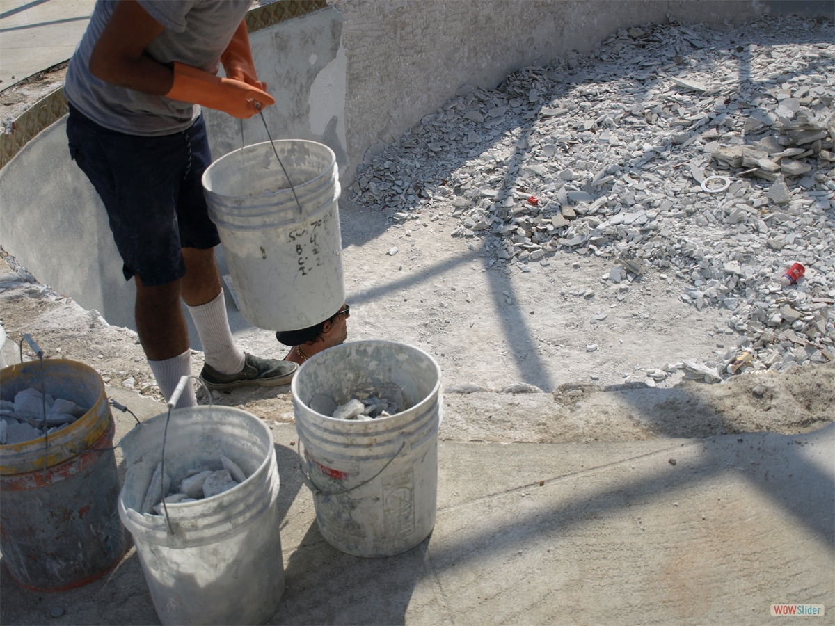 Later the rubble is shoveled into buckets ... Later the rubble is shoveled into buckets ...