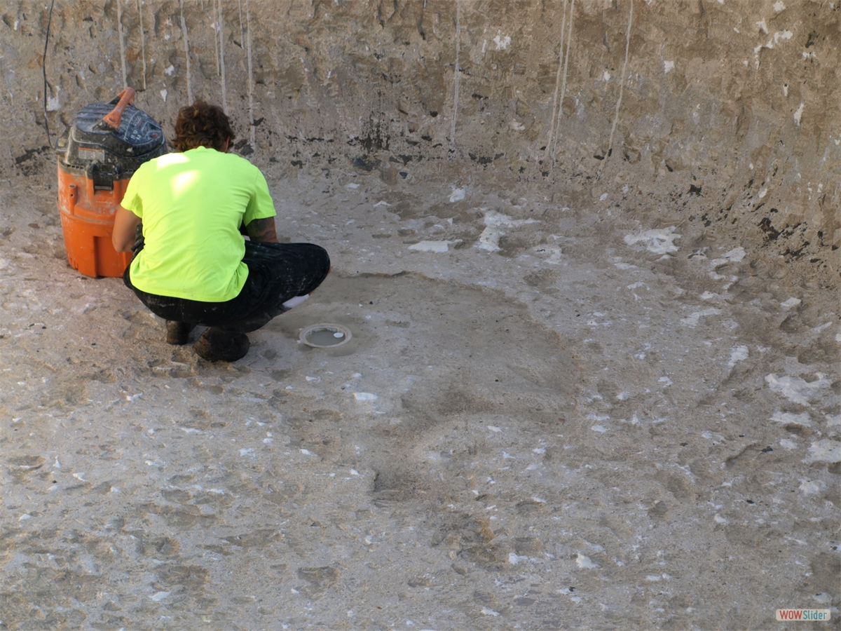 ... levelling the rough surface with sprayed concrete, ... ... levelling the rough surface with sprayed concrete, ...