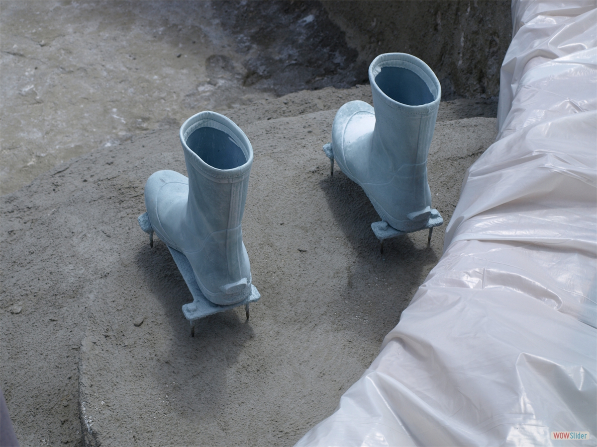 Rubber boots on spikes ... Rubber boots on spikes ...