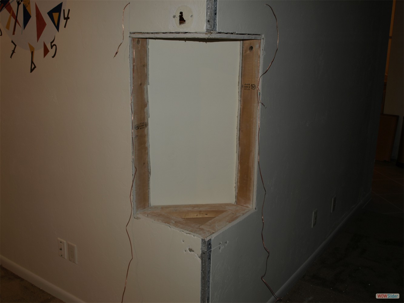 ... Juergen cut out a piece of the drywall ...