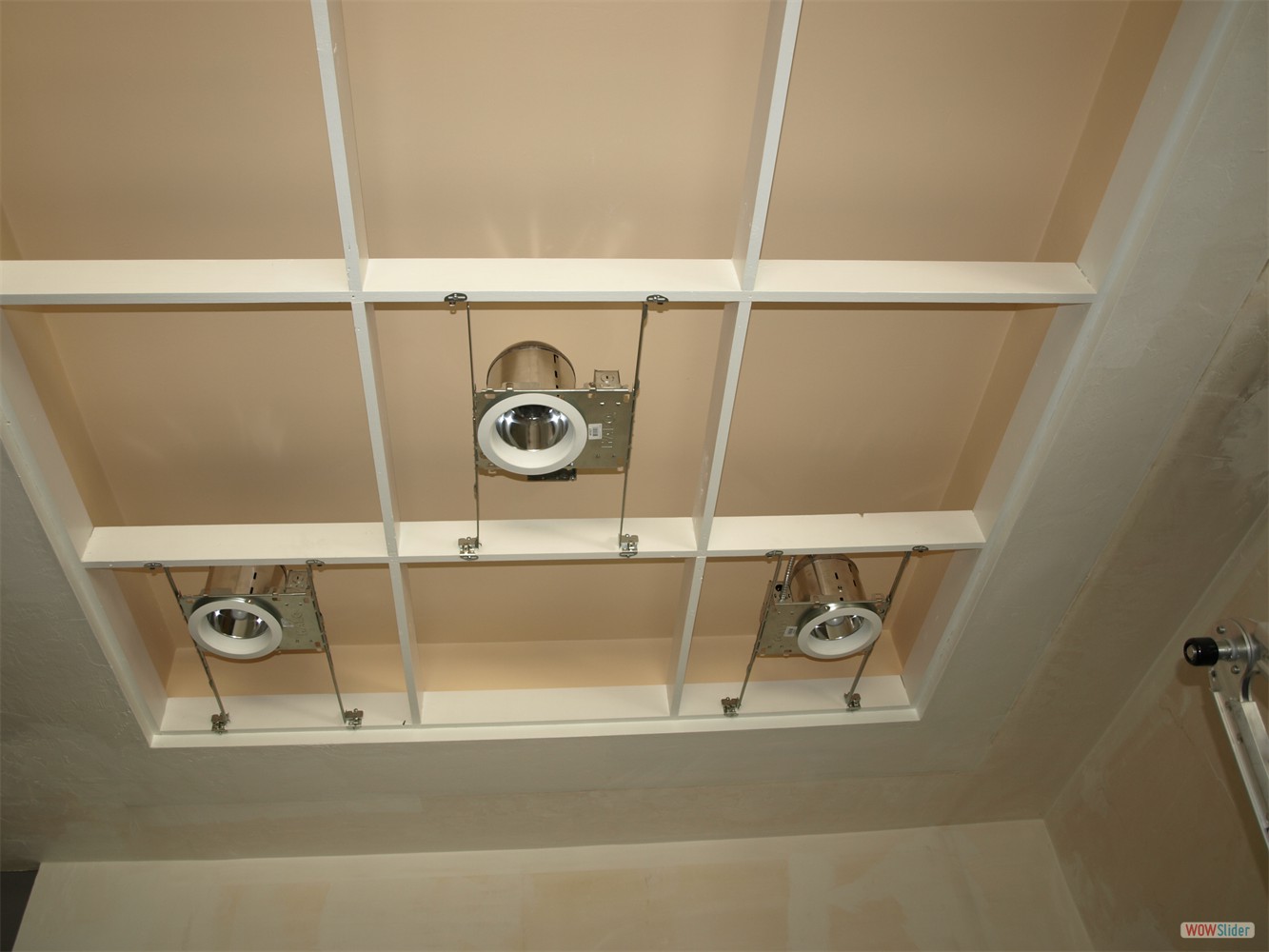 The original yellow plexiglass panes in the ceiling have disappeared, some paint and industrial ceiling lights bring a lot more light into the room The original yellow plexiglass panes in the ceiling have disappeared, some paint and industrial ceiling lights bring a lot more light into the room