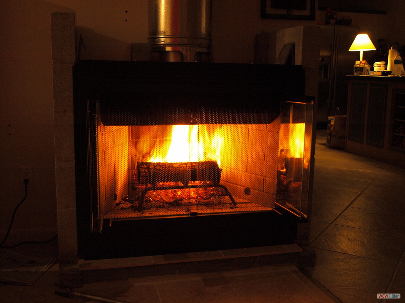 Unfortunately the front doors are that well insulated we have to open them to feel the heat!