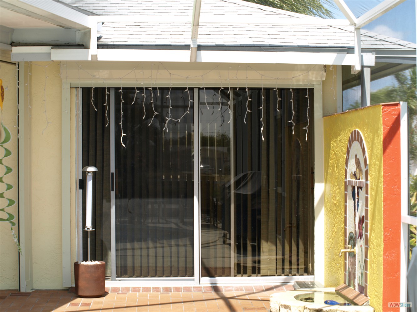 Raised shutter in front of the bedroom sliding door