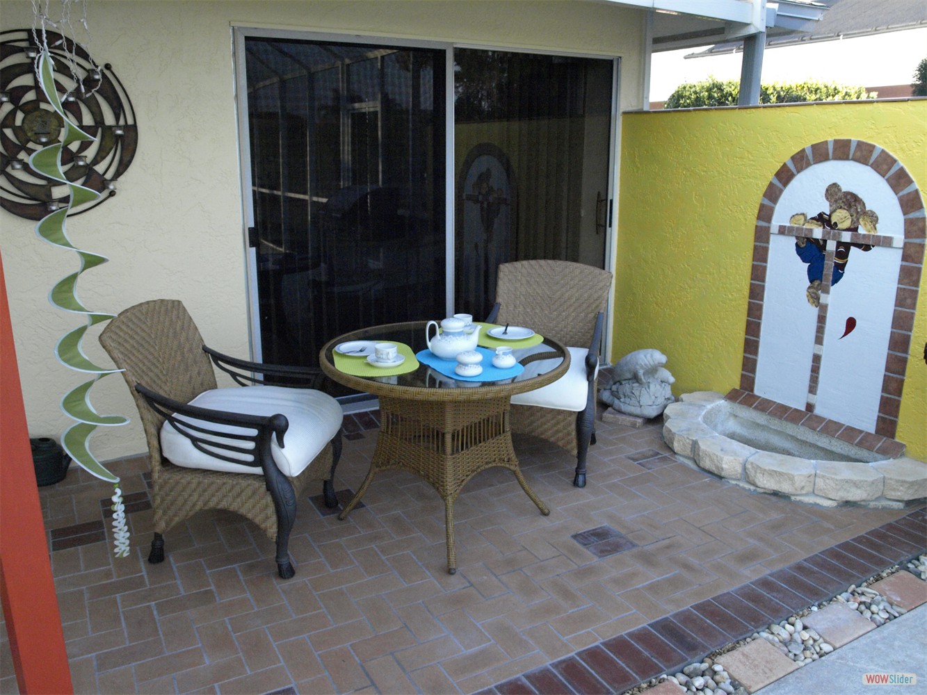 ... an old black outdoor carpet and a flower bed full of weeds, isn't it?