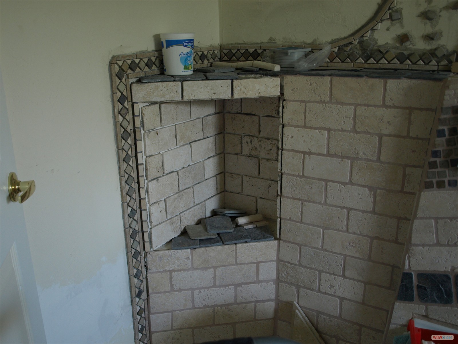 When the pipes where encased a small open storage compartment formed When the pipes where encased a small open storage compartment formed