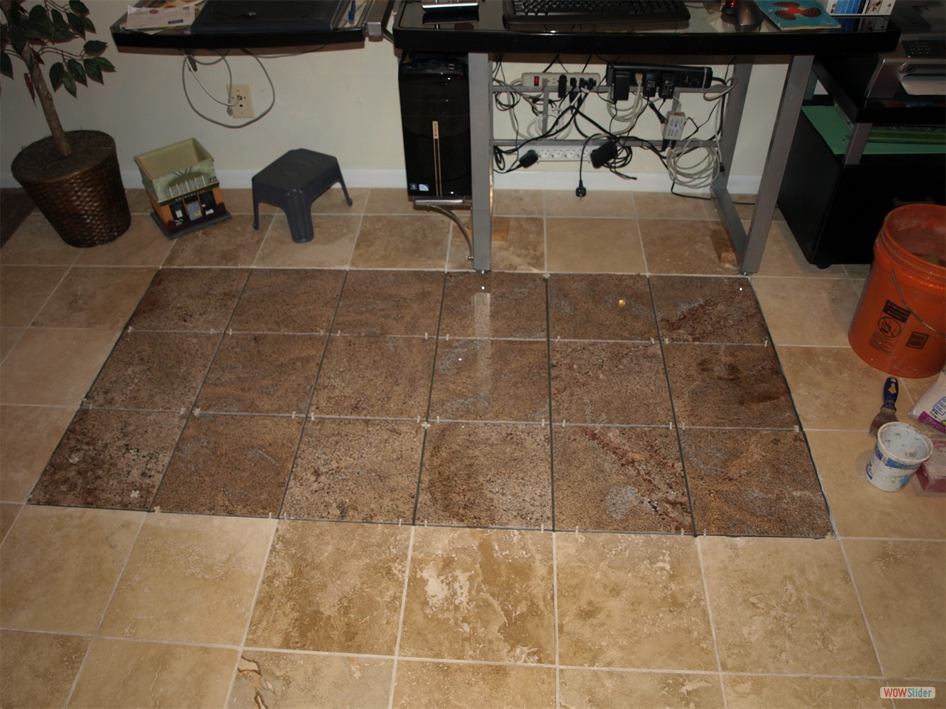 ... replacing them with granite tiles.