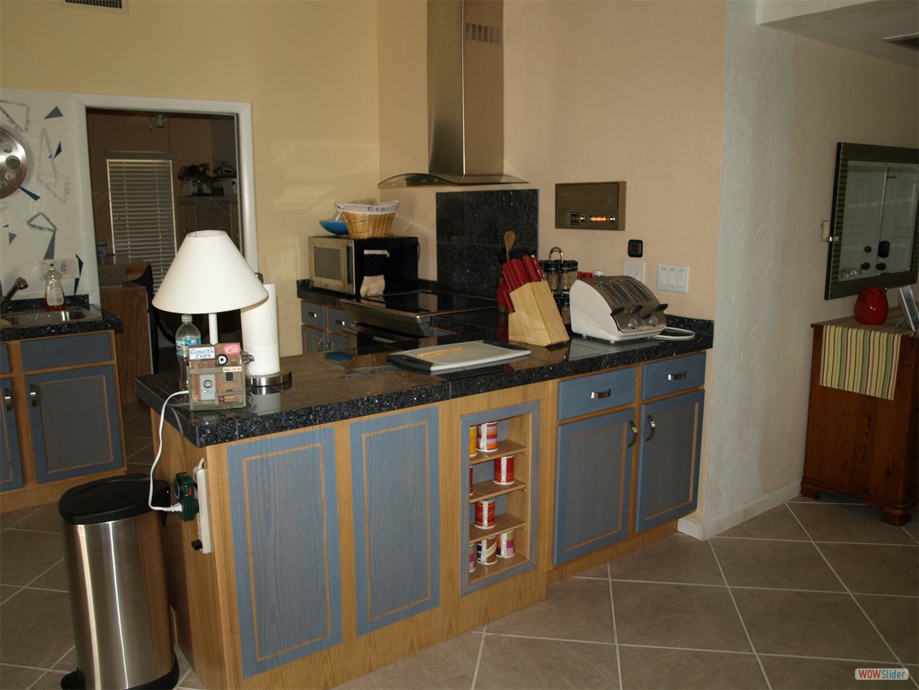 All cabinets are painted and set up witth a granite surface, ...